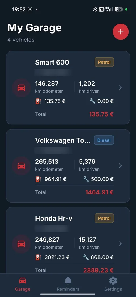 CarLog garage screen listing four vehicles with odometer, kilometres driven, fuel and maintenance spend