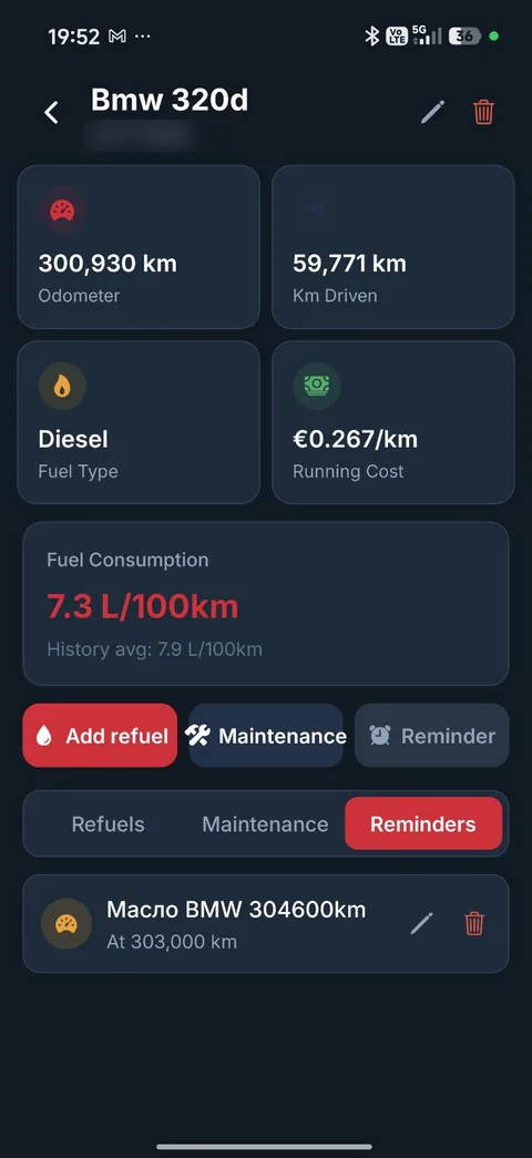 CarLog reminders tab with an oil change reminder set for a specific odometer reading